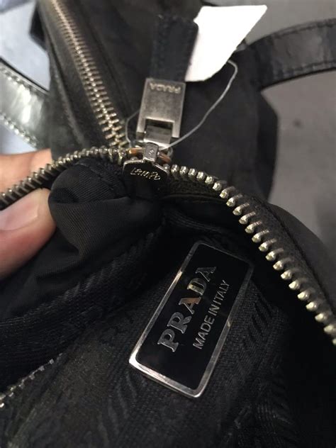 prada lampo zipper|how to authenticate prada bags.